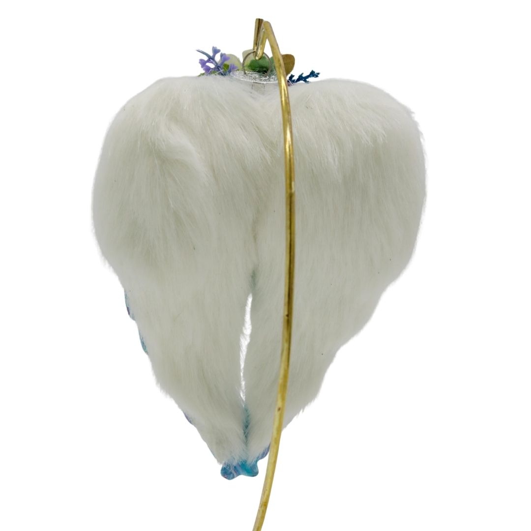 Back view of angel wings memorial ornament with white backing and metal display stand