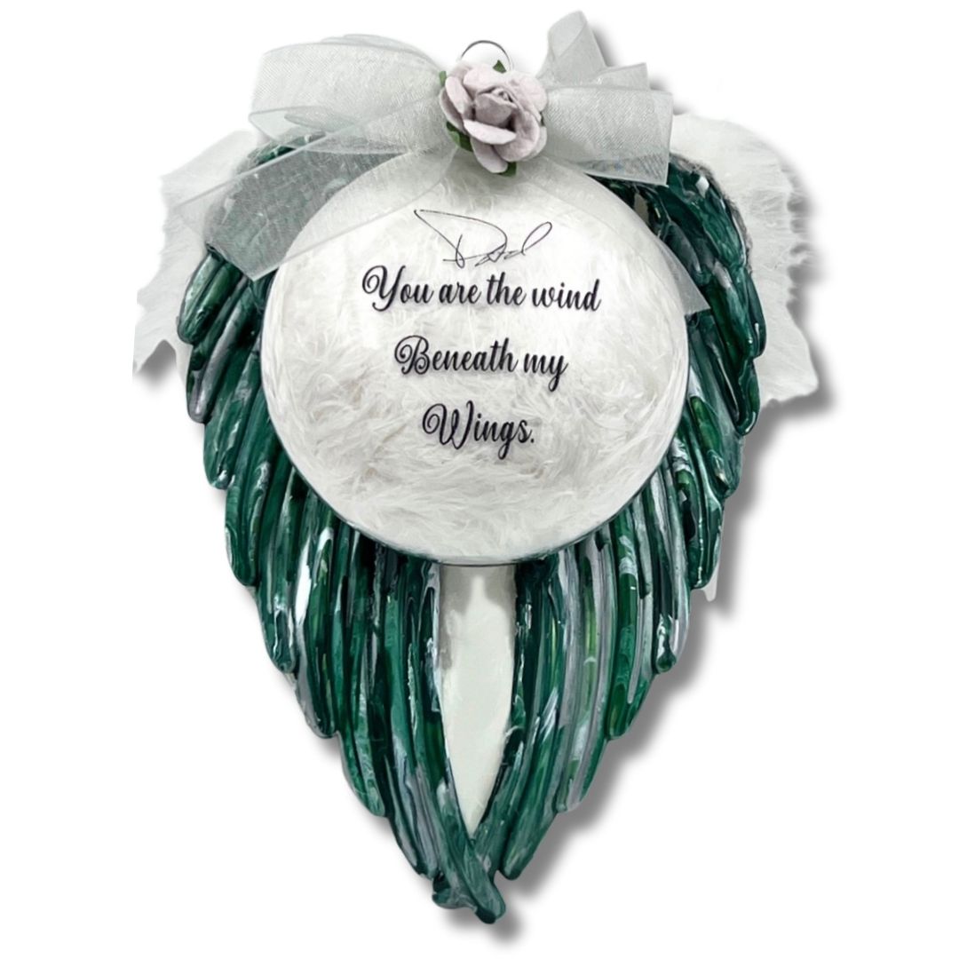 Green angel wings memorial ornament with engraved glass disc and personalized remembrance message.