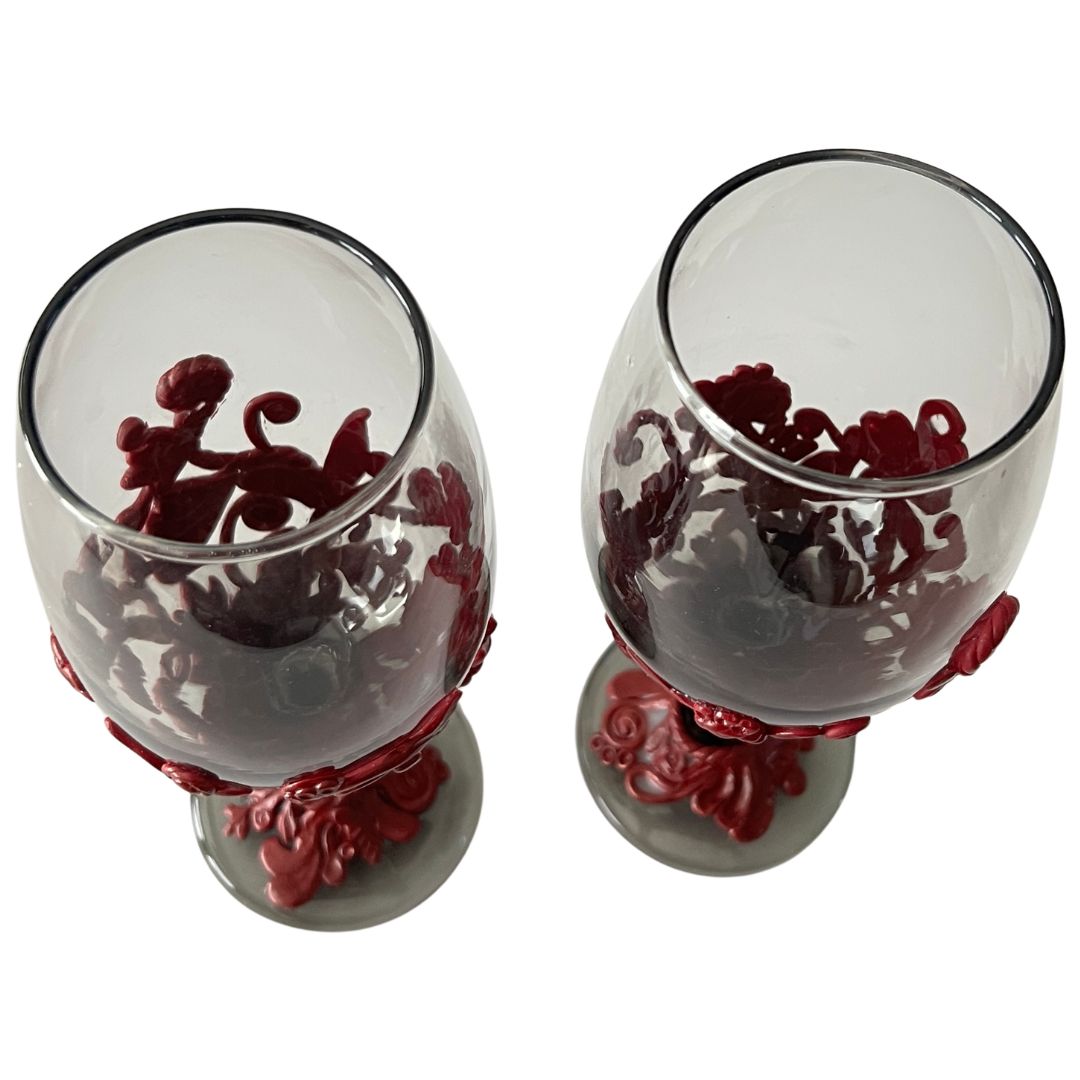 Interior view of hand sculpted burgundy wine glasses showing sculpted design