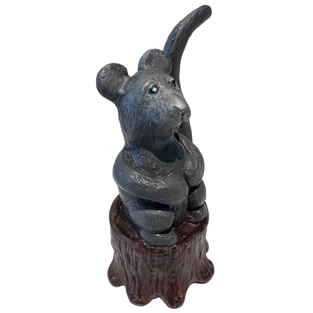 side view of gray mouse ring holder sculpture on a wood stump base hand sculpted from polymer clay