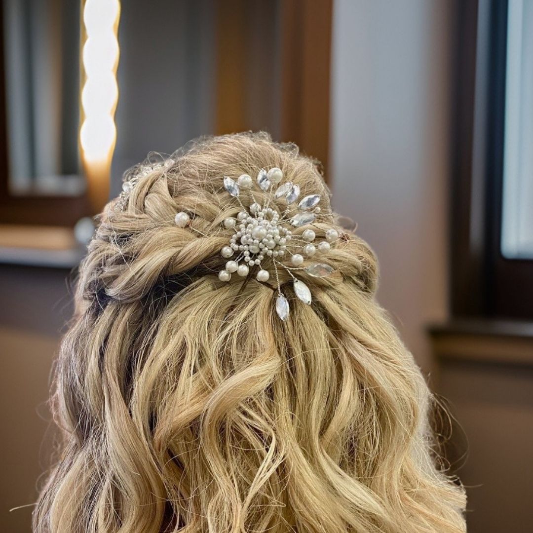 Ivory pearl floral hair pin with marquise crystals and silver wire branches for bridal or formal hairstyles