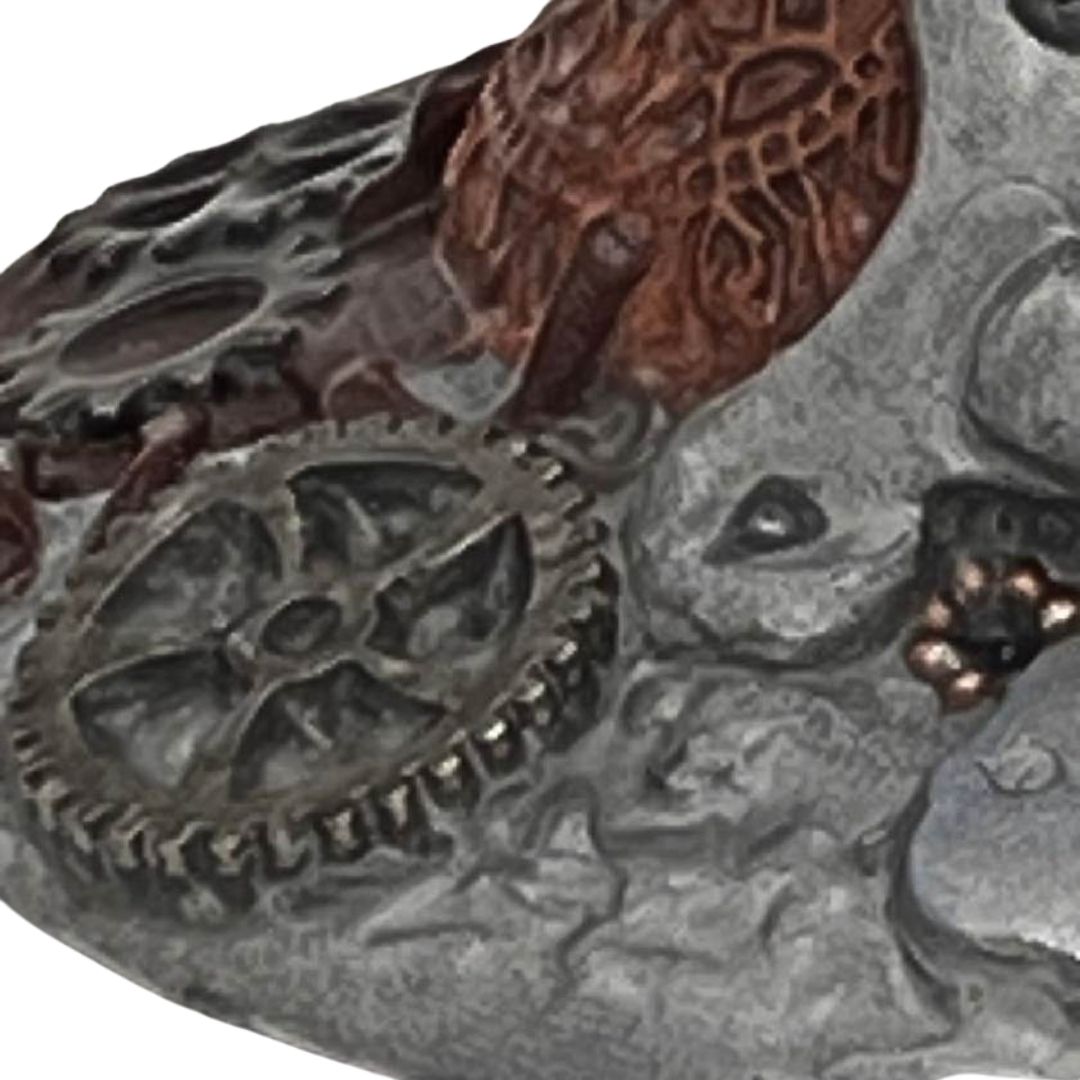 Close-up of steampunk wine glass base featuring detailed metal gear elements and textured polymer clay in a copper and silver finish by Daree’s Designs
