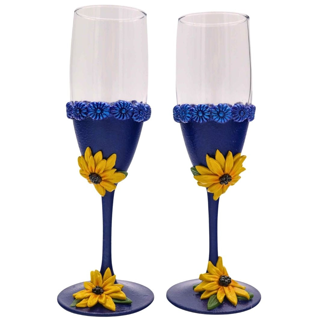 Back view of handmade champagne flute with sapphire blue polymer clay and sculpted texture detail