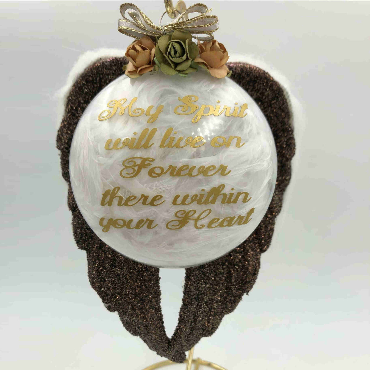 These acrylic ornaments are made in a variety of colors with custom verses, and adorned with glitter, feathers, fur, charms, flowers, or other decorative elements dependent on your selection.