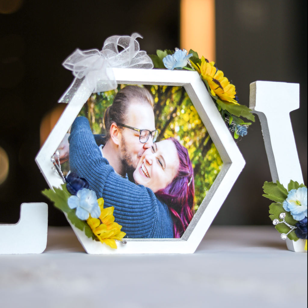 Handmade sunflower LOVE photo centerpiece with blue floral accents and couple photo, a unique gift for weddings, anniversaries, or meaningful home decor
