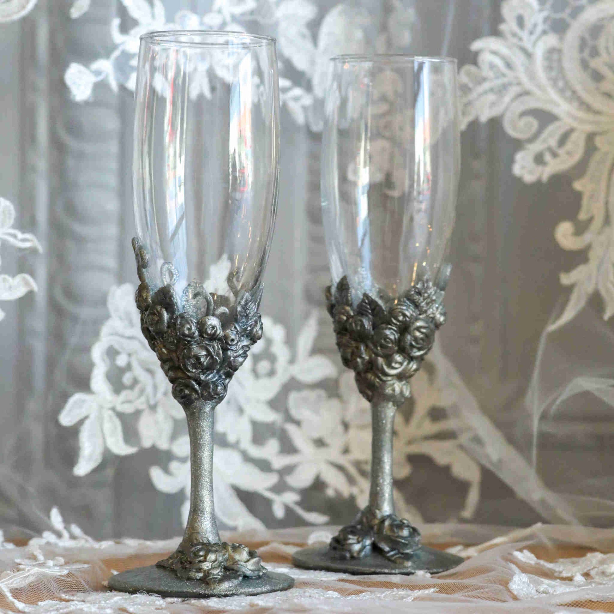 https://dareesdesigns.com/cdn/shop/products/silver-roses-champagne-flute-set-lifestyle-2_2000x.jpg?v=1665291703