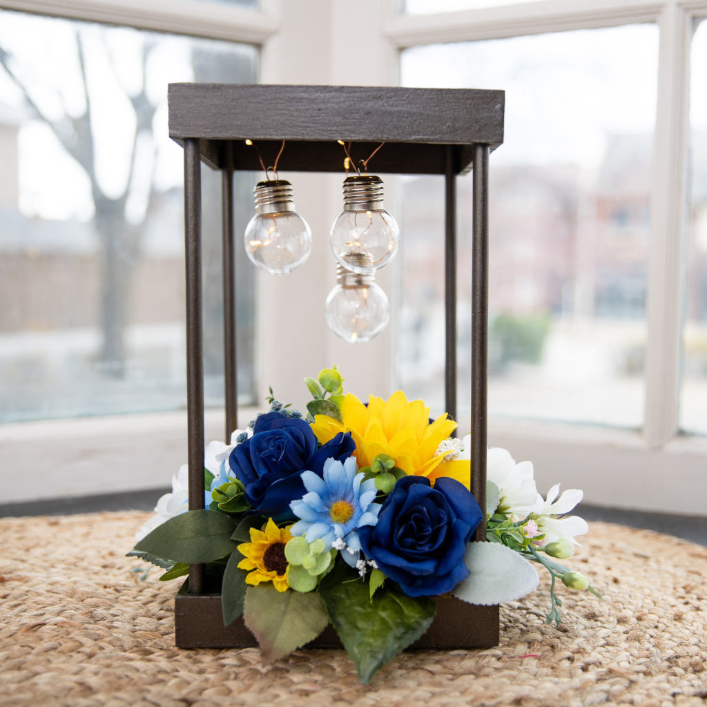 Sunflower and Sapphire Roses Lantern Lighted Centerpiece